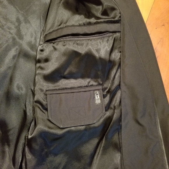 Impermeable jacket - Picture 2 of 7